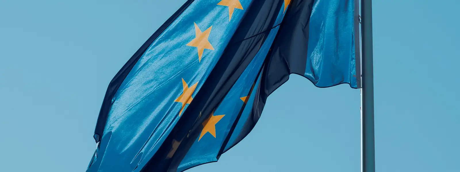 European Union flag against a blue sky